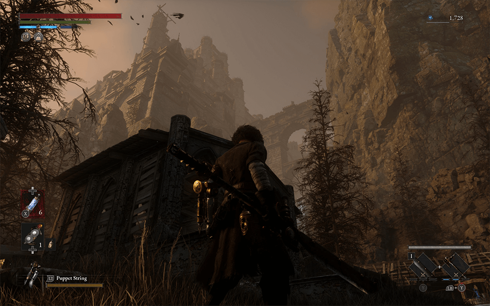 A screenshot from the game lies of p showing the view of a church up on a mountain