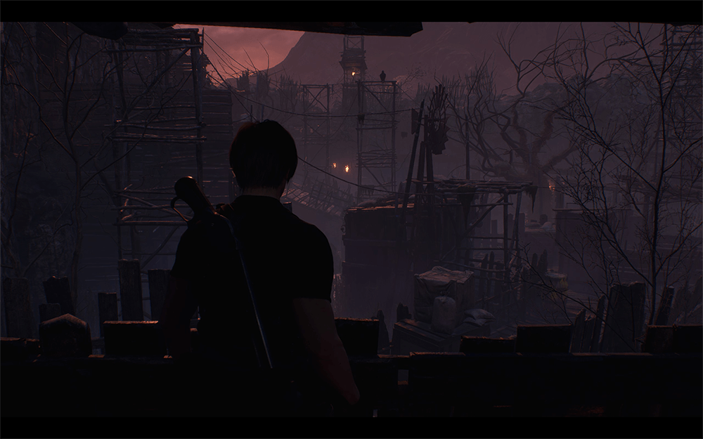 A screenshot from resident evil 4 remake showing leon looking at a village