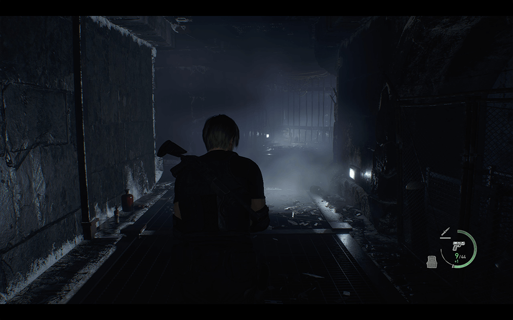 A screenshot from resident evil 4 remake walking through some dark corridor