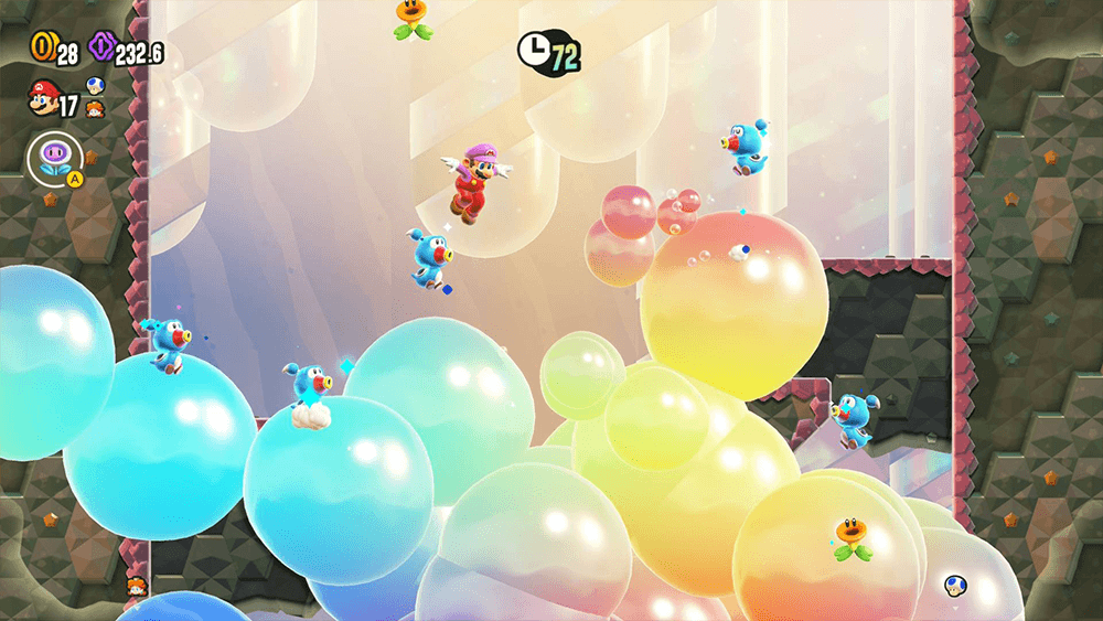 A Screenshot from Super Mario Wonder showing mario jumping up on colorful bubbles
